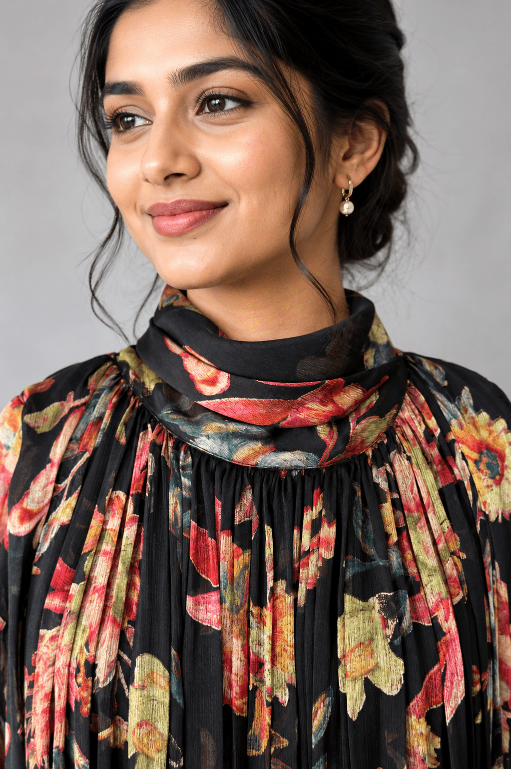 Gulnaar Black Floral Crushed Chiffon Dress with floral print and elegant pleated design for festive and party wear close up view