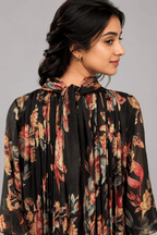 Gulnaar Black Floral Crushed Chiffon Dress with floral print and elegant pleated design for festive and party wear back view