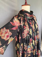 Gulnaar Black Floral Crushed Chiffon Dress with floral print and elegant pleated design for festive and party wear real side view