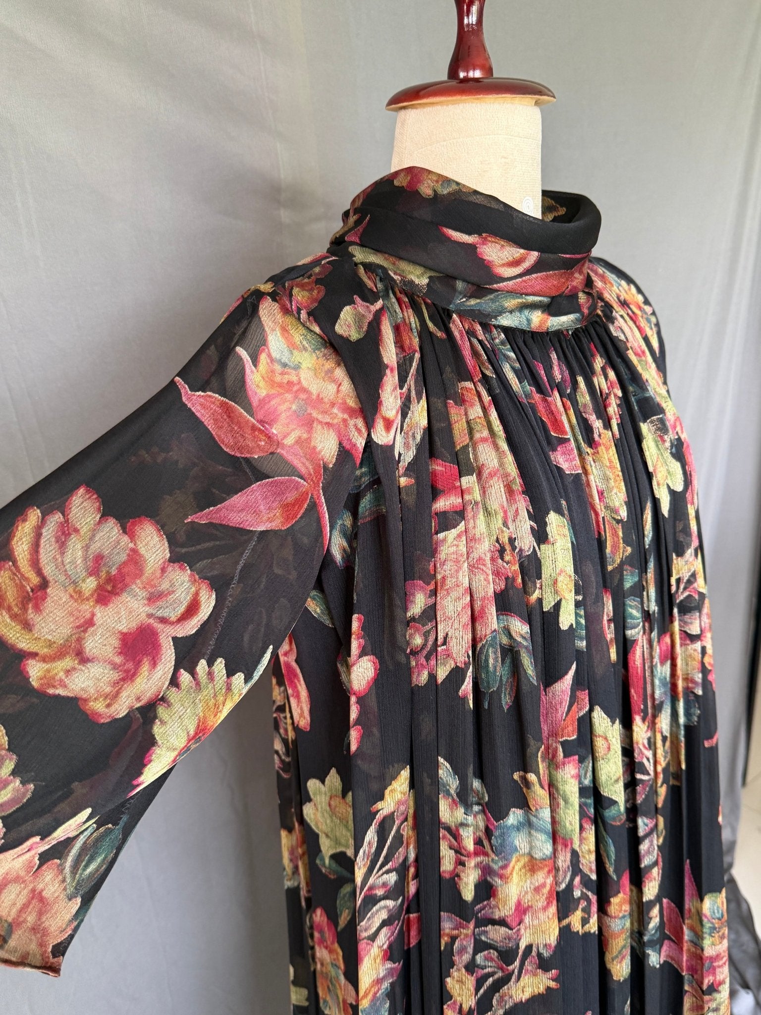 Gulnaar Black Floral Crushed Chiffon Dress with floral print and elegant pleated design for festive and party wear real side view